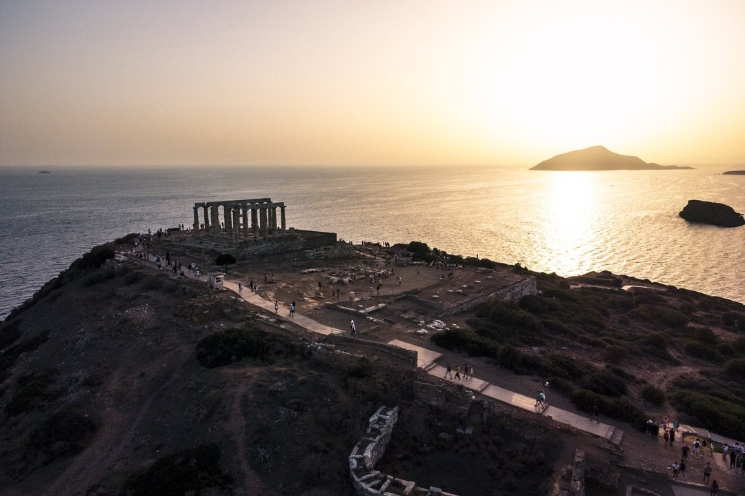Serene Ancient Greek Ruins - Majestic Sunset over Aegean Sea