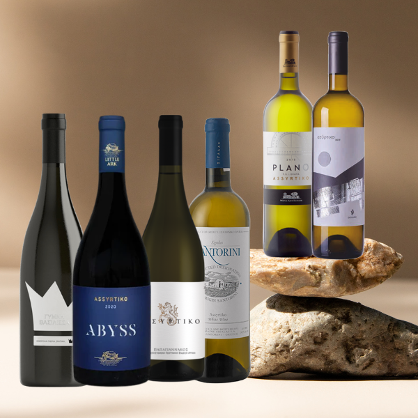 Probierpaket Assyrtiko von vineas.shop mit verschiedenen trockenen Weinsorten auf einem neutralen Hintergrund