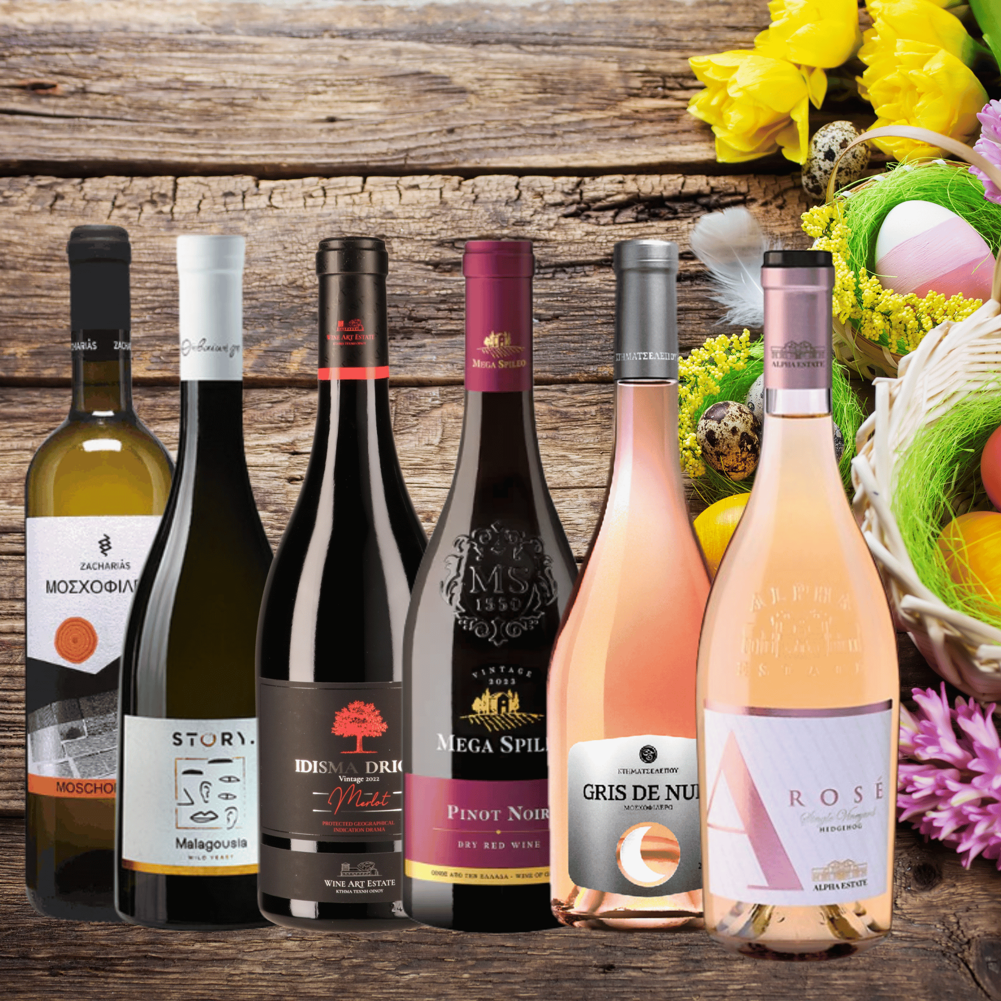 Oster-Rundum-Sorglos-Paket von vineas.shop mit verschiedenen Weinen in einer bunten Osterdekoration